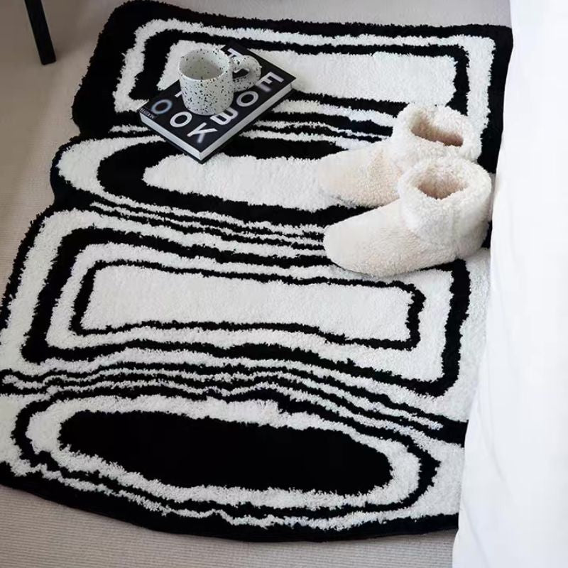 Geometric pattern black and white rug