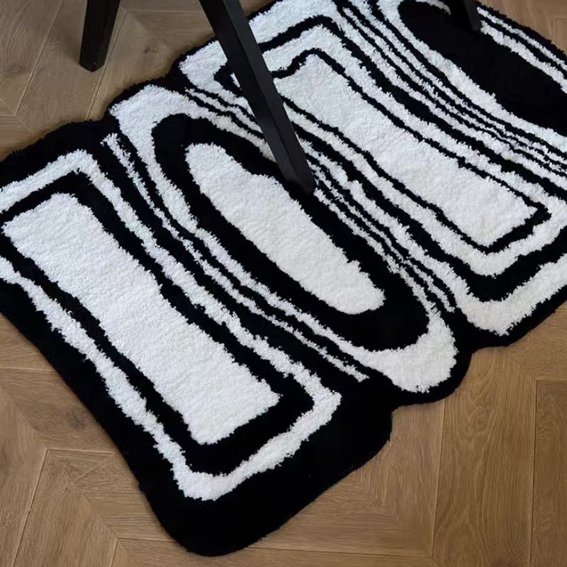 Geometric pattern black and white rug