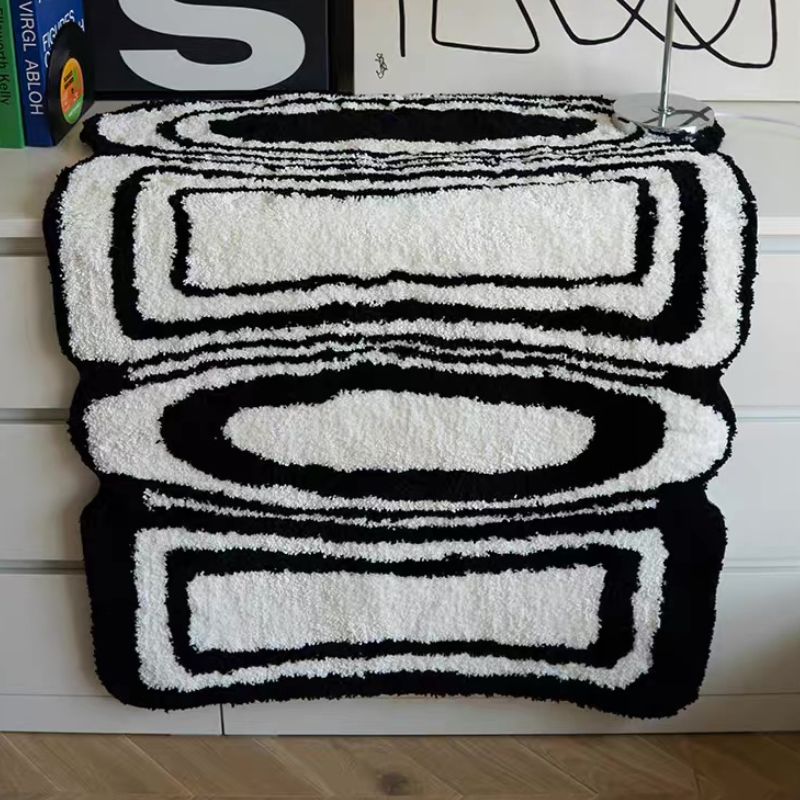 Geometric pattern black and white rug