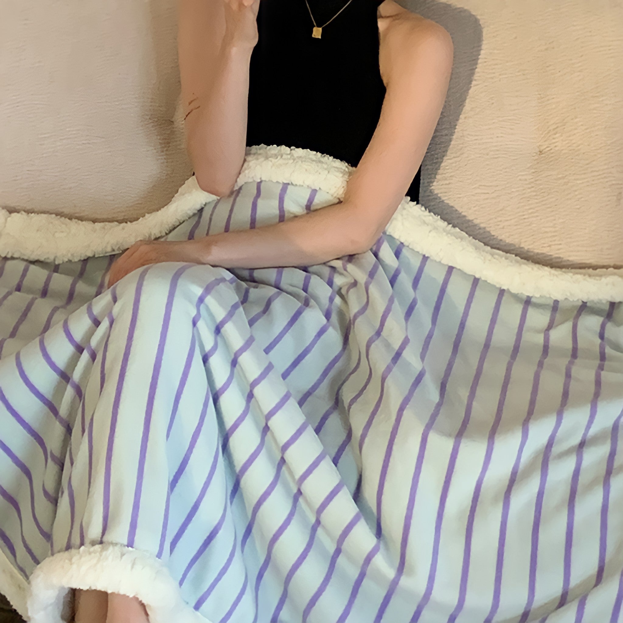 Striped fleece blanket in light green