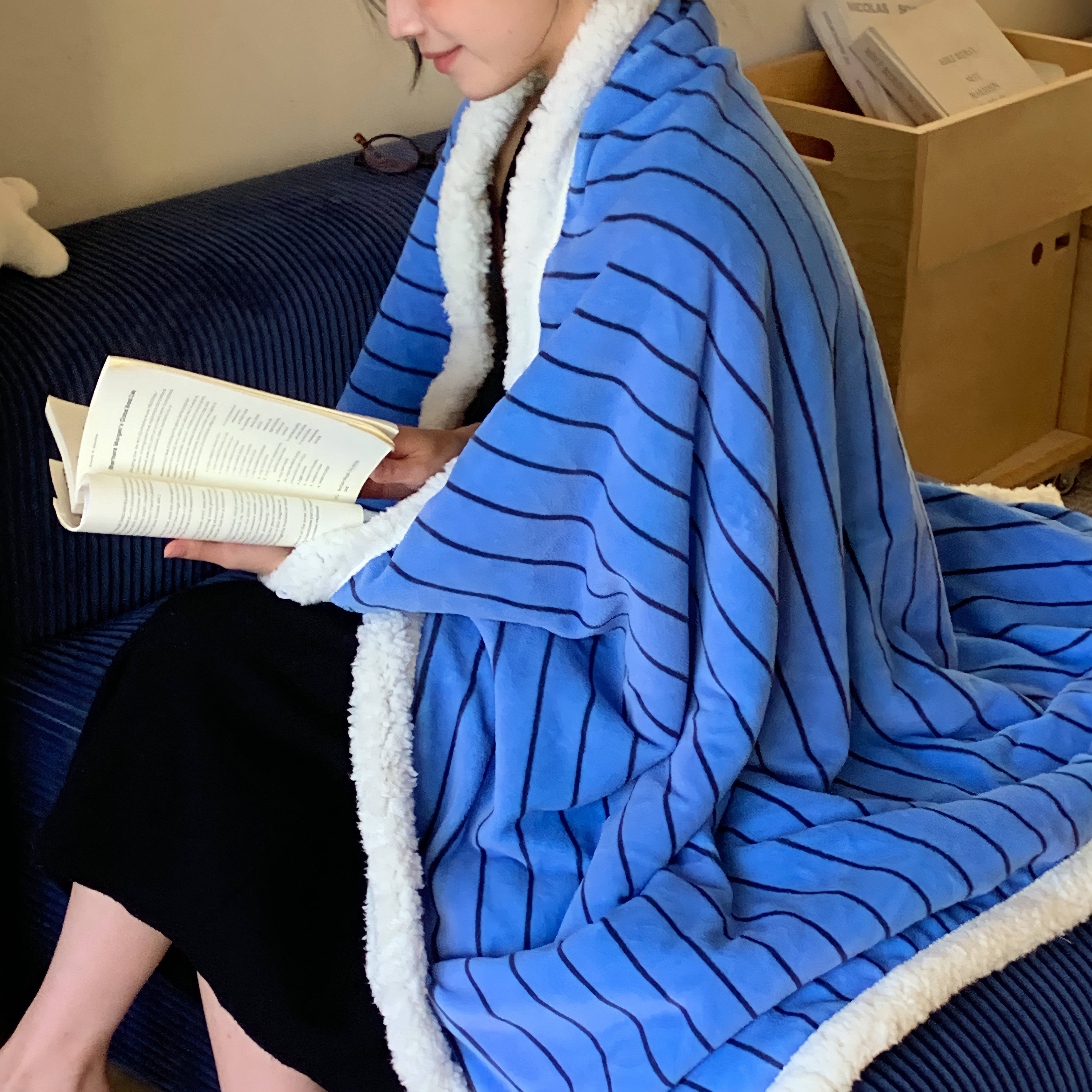 Striped fleece blanket in blue