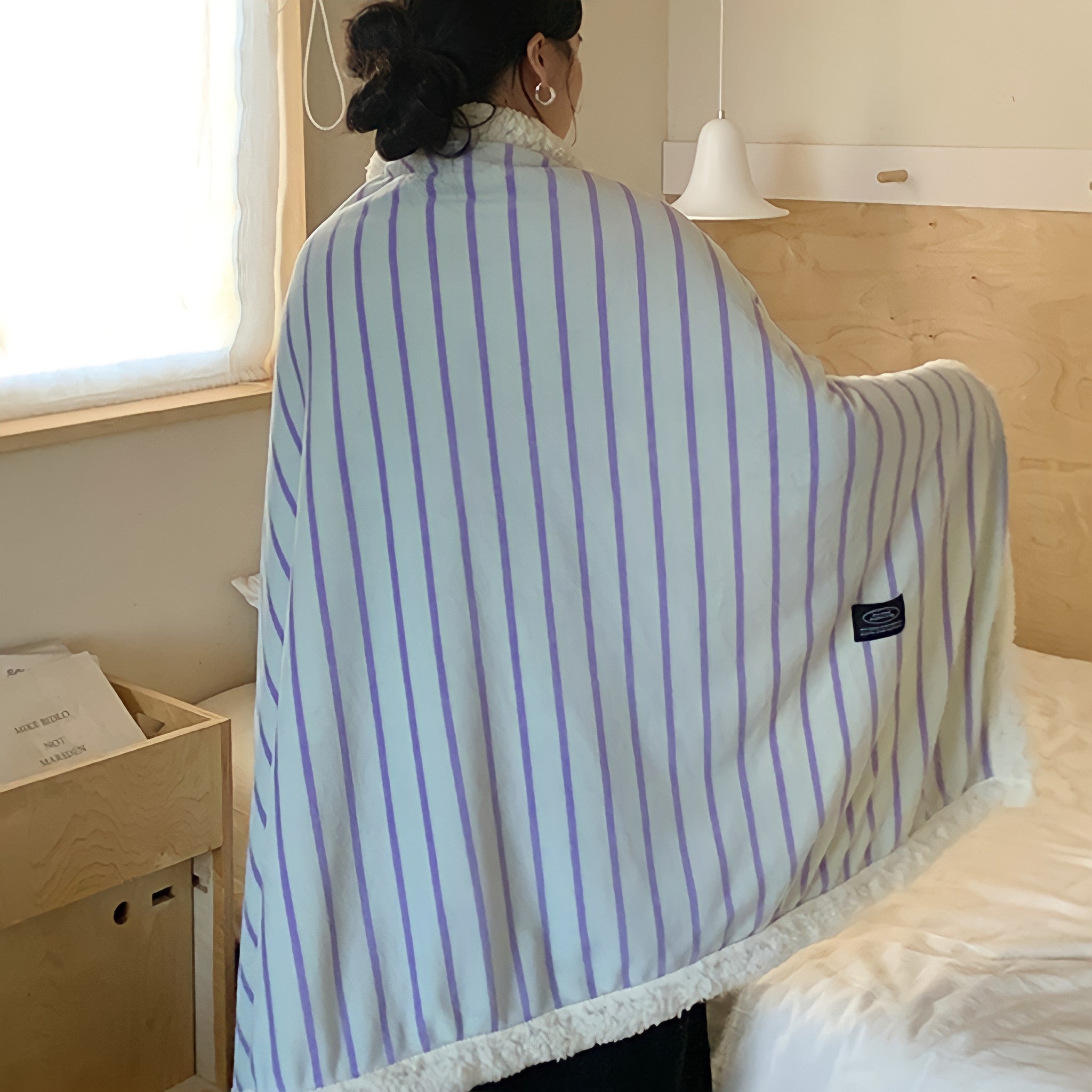 Striped fleece blanket in light green