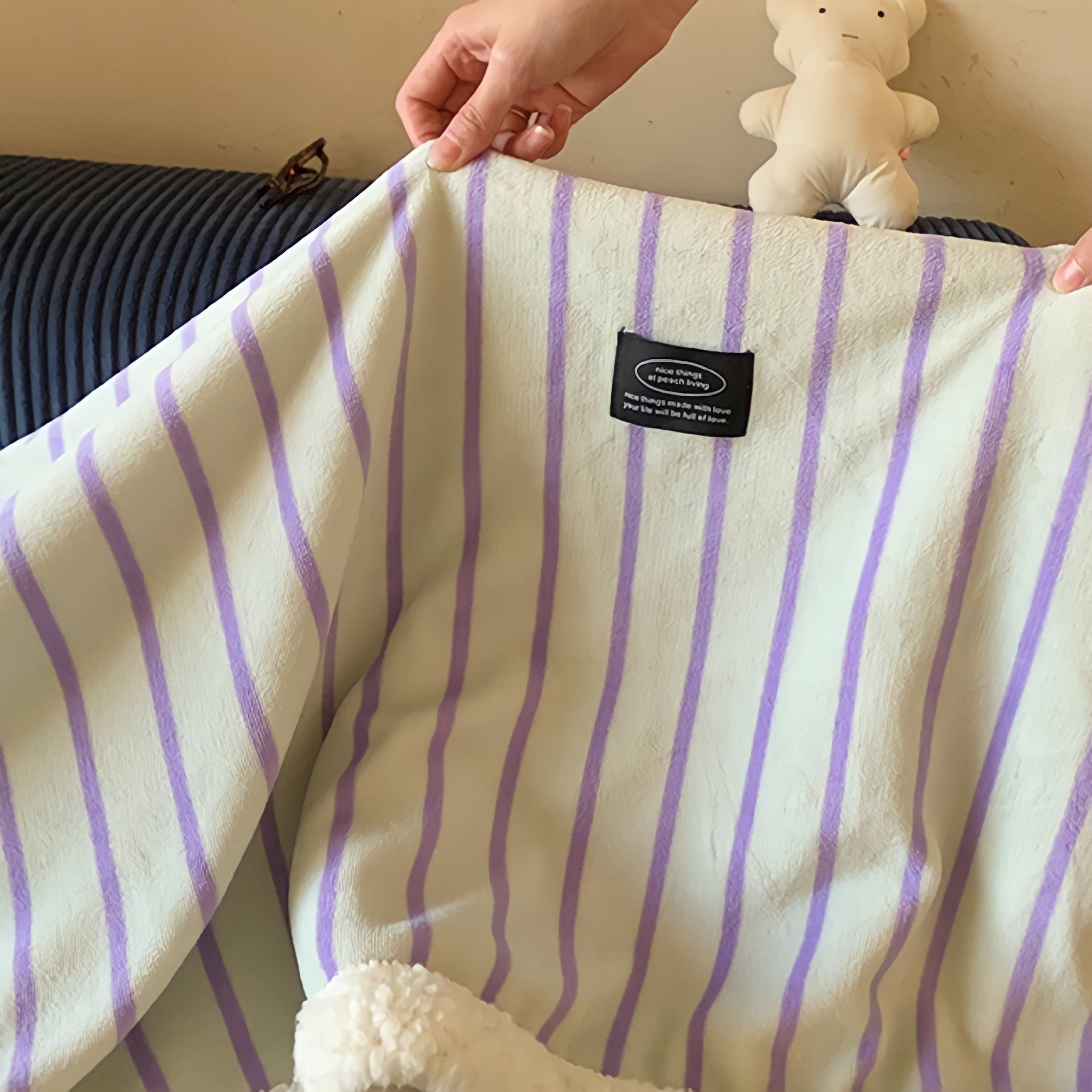 Striped fleece blanket in light green