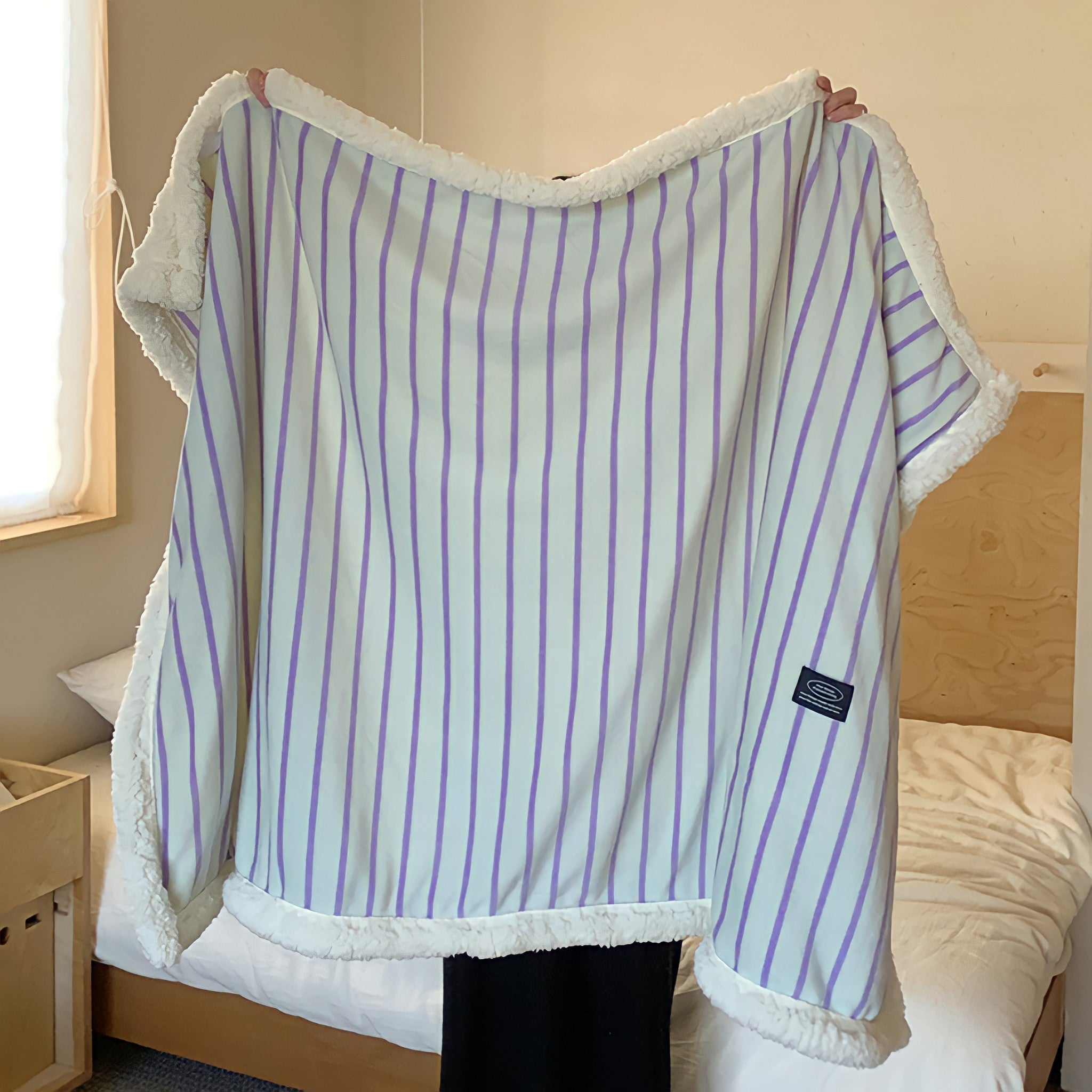 Striped fleece blanket in light green