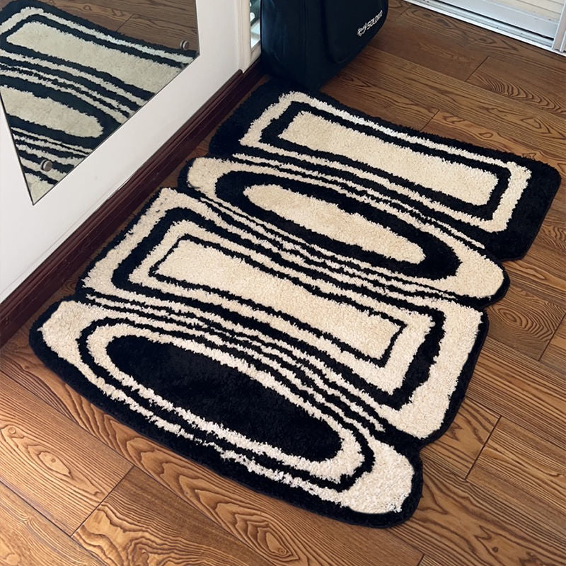 Geometric pattern black and white rug