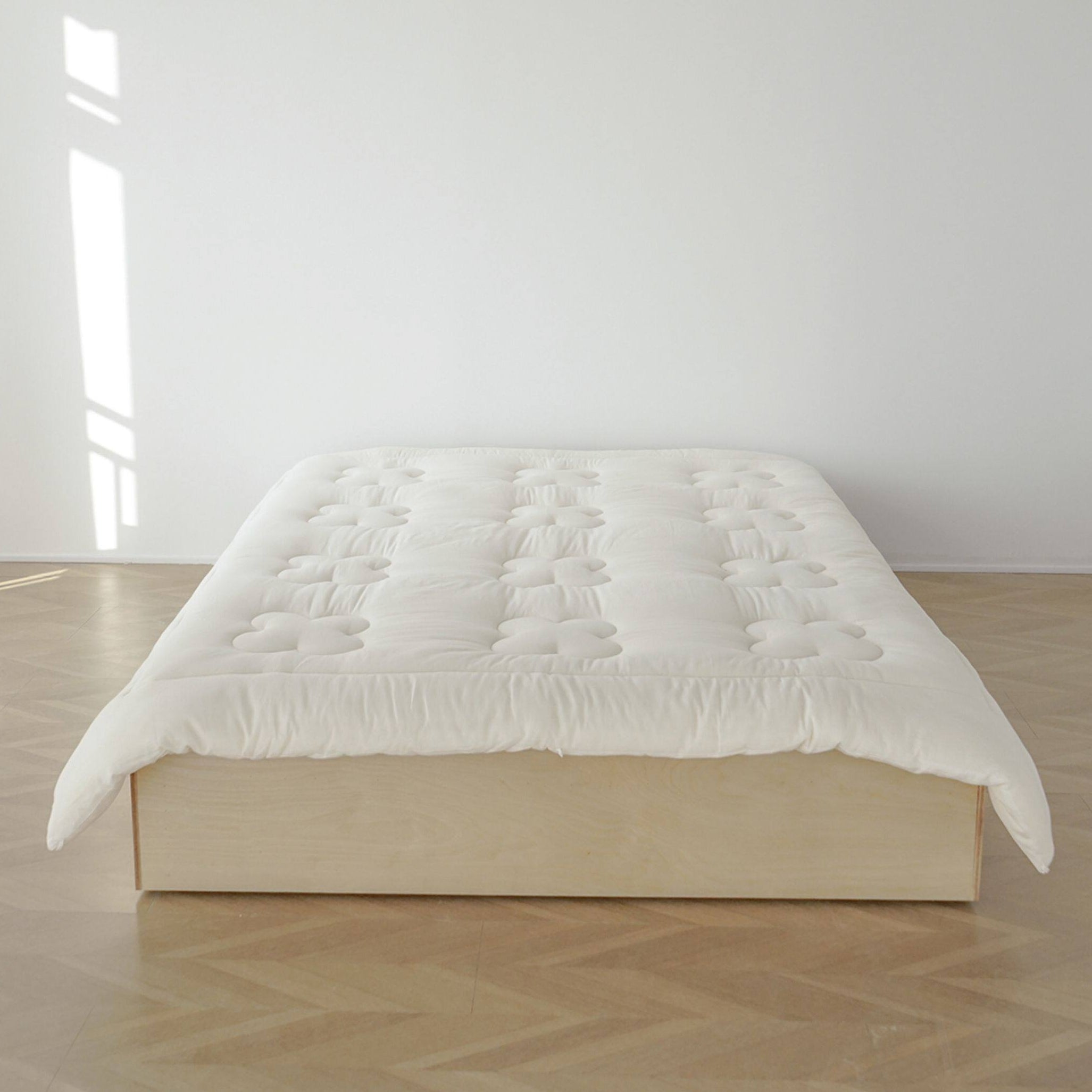 Floral quilted futon