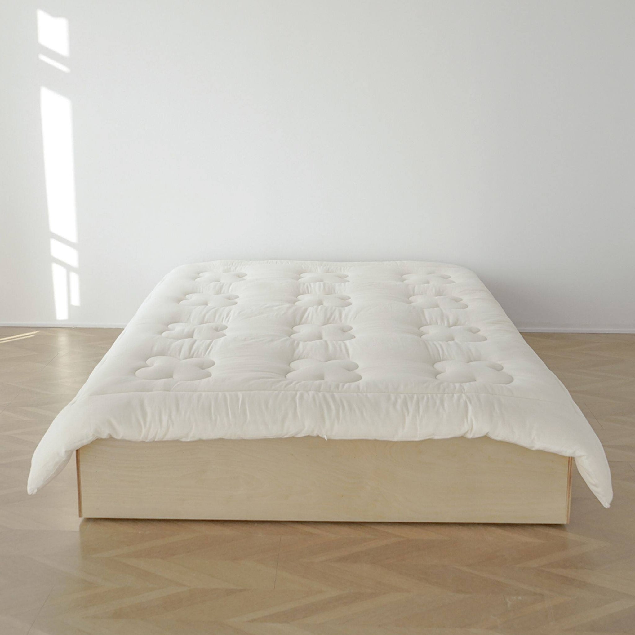 Floral quilted futon