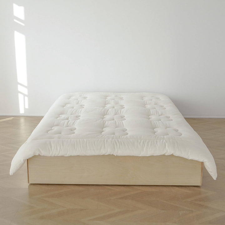 Floral quilted futon