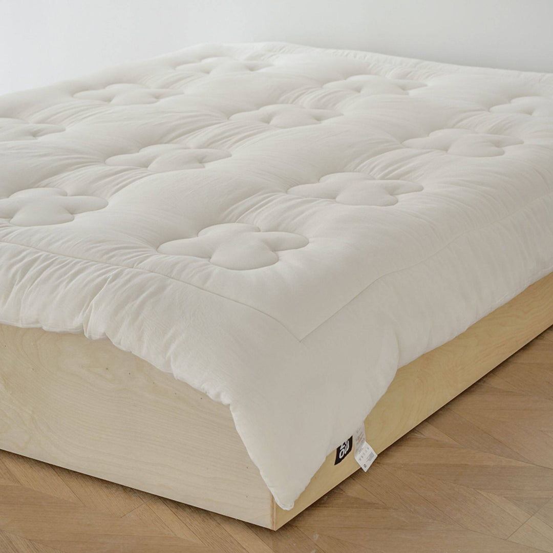 Floral quilted futon