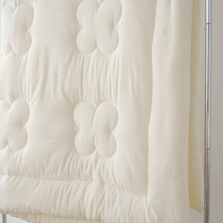 Floral quilted futon
