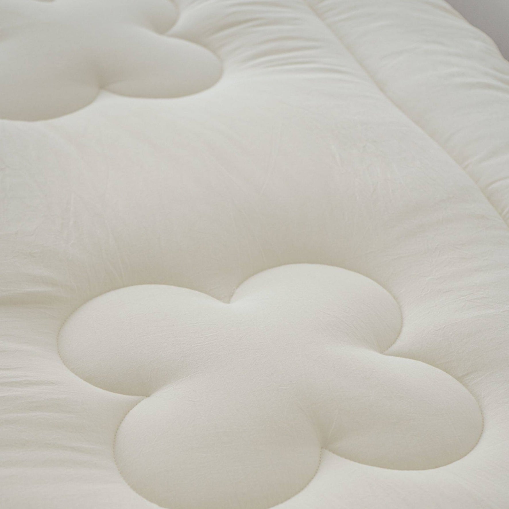Floral quilted futon